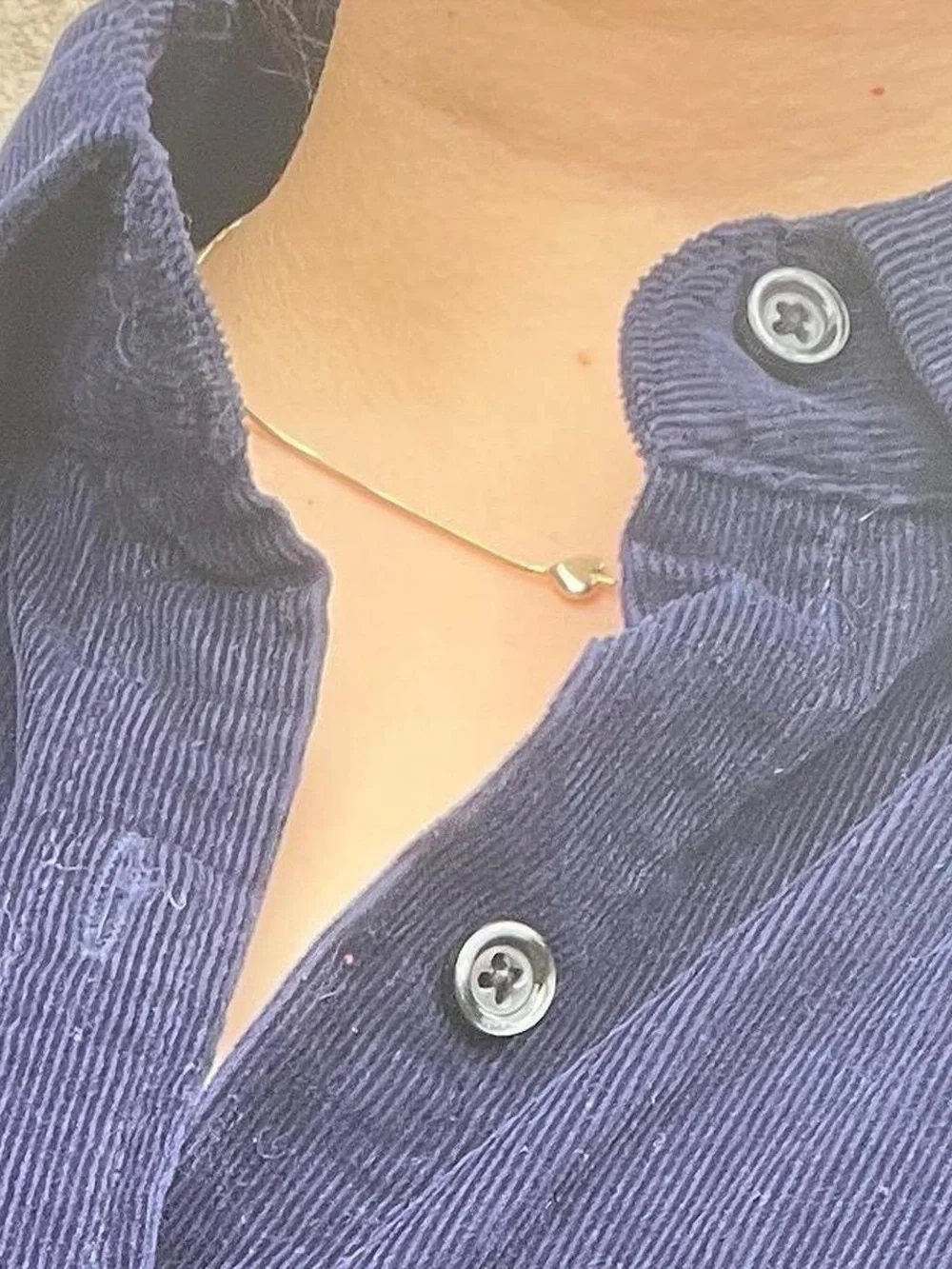 Purple corduroy button-up shirt